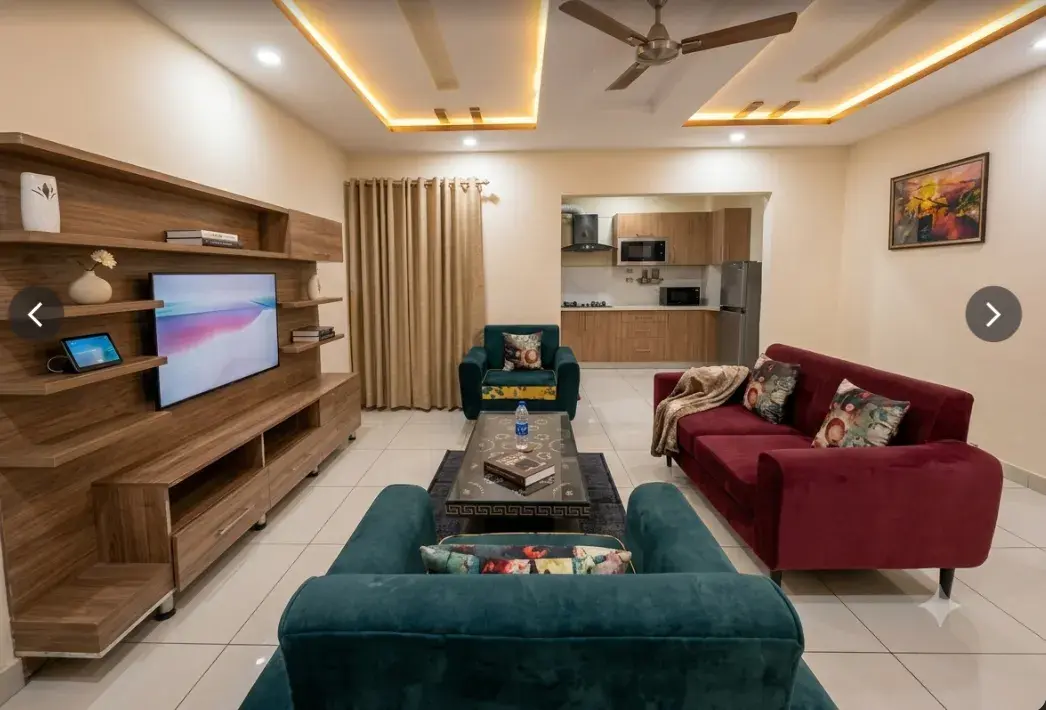 Apartment lounge with dining and kitchen at Grand Empire Hotel Rawalpindi
